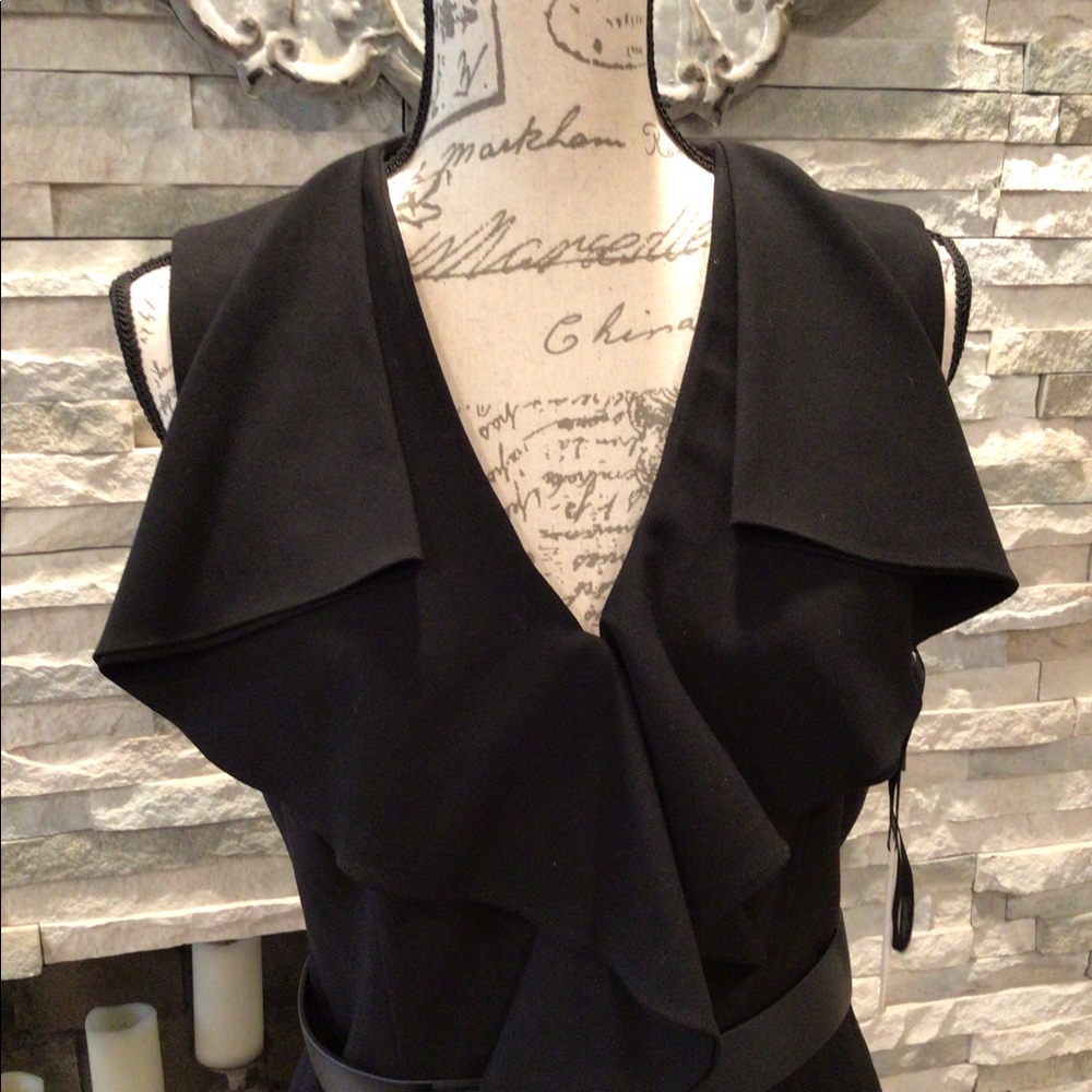 Calvin Klein black ruffled sheath dress.